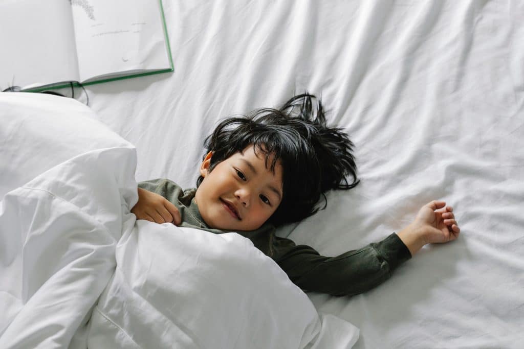 How early can adhd be diagnosed? This child in his bed is showing signs that his parent is curious about.