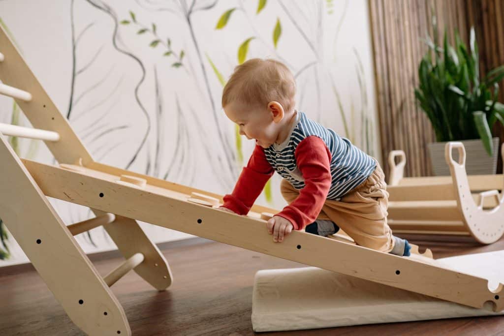 How Do You Calm a Child With ADHD? a kid gets his energy out by climbing.