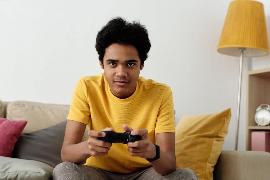 adhd without hyperactivity. A kid plays video games.