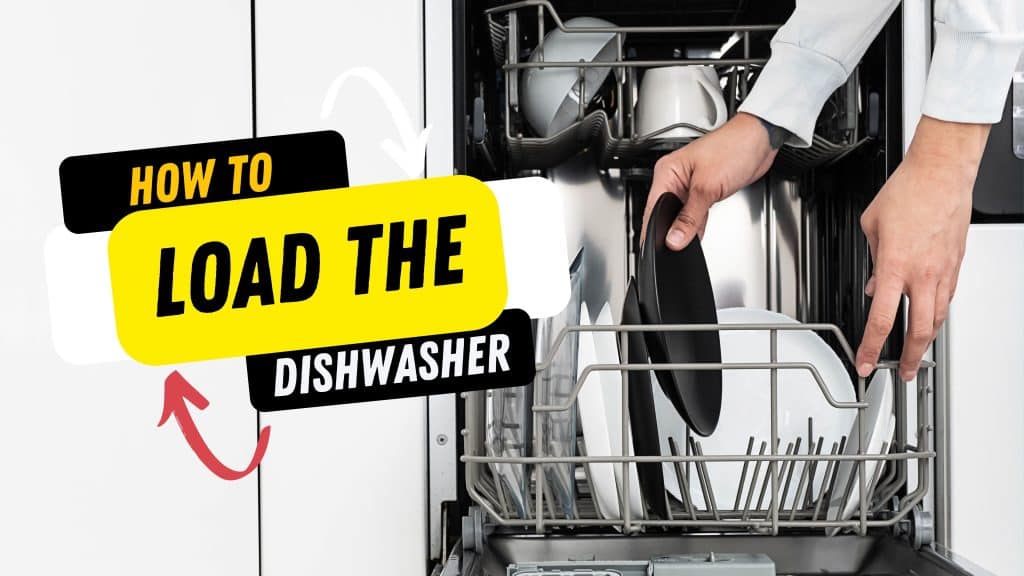 load the dishwasher. a person is loading the dishwasher with dirty dishes.