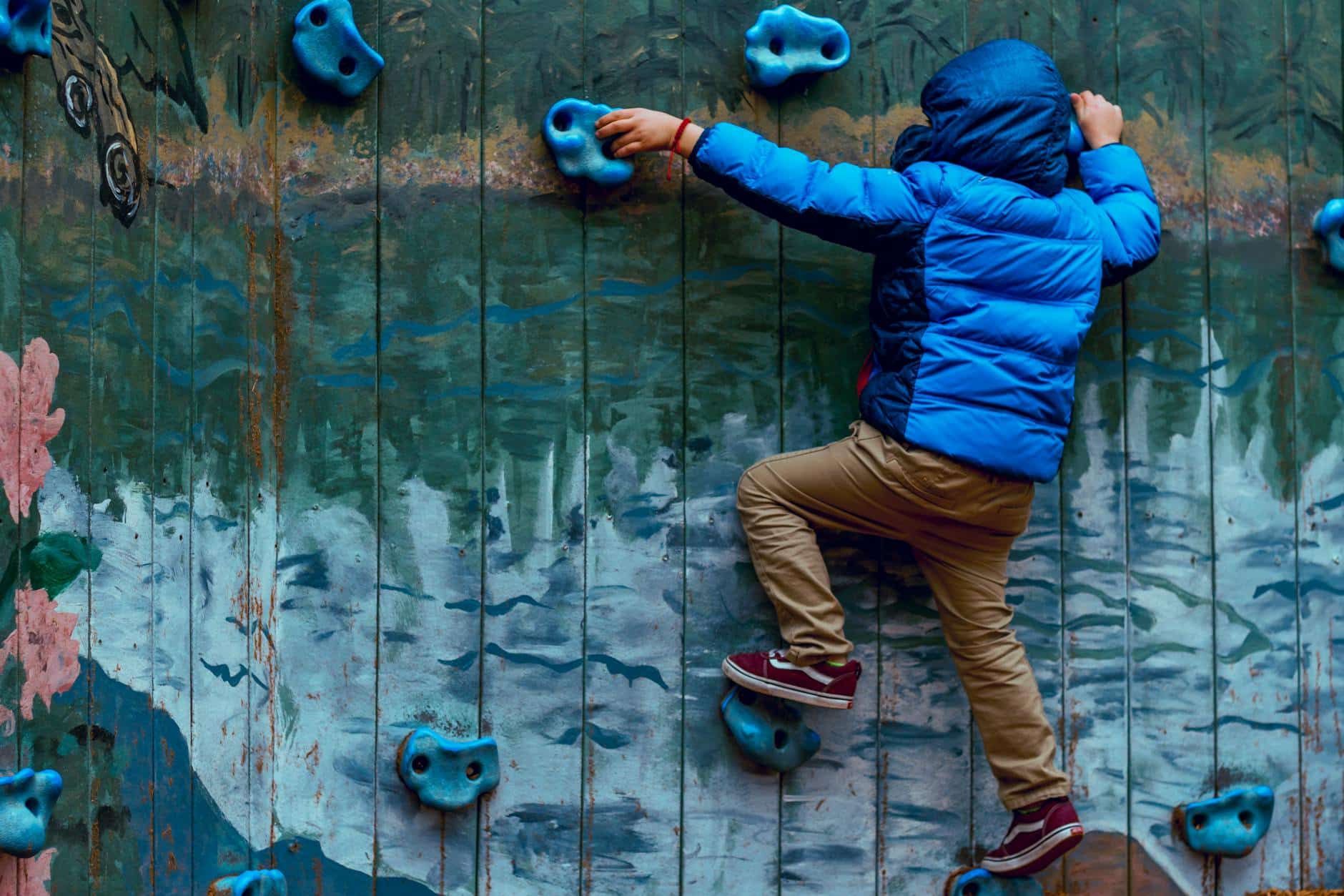 can you reverse autism photo of boy wall climbing